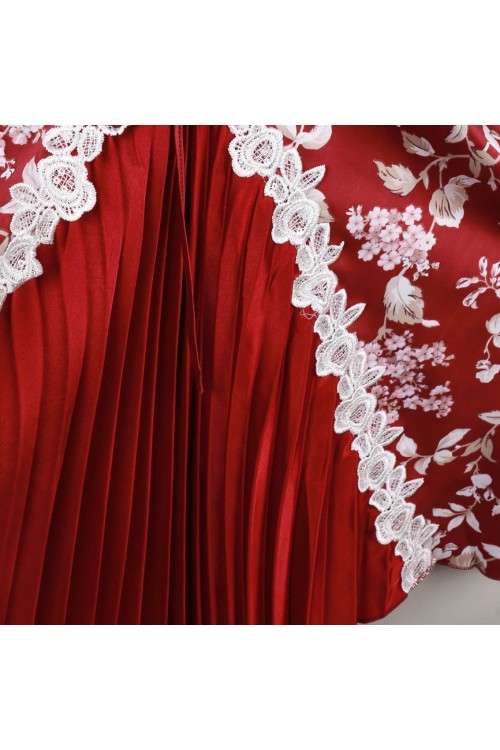 قميص ساتان بطبعات زهور وتفاصيل كسر