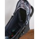 عربة أطفال مع حزام أمان ومظلة مزين بطبعات