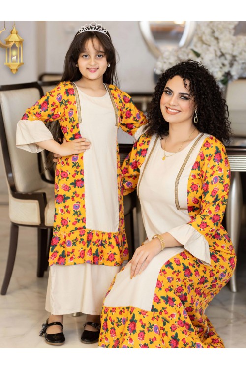 جلابية رمضانية بناتي تتميز بأكمام طويلة وجوانب مشجرة وحزام على الظهر