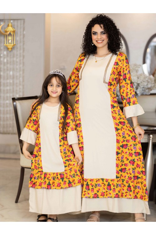 جلابية رمضانية بناتي تتميز بأكمام طويلة وجوانب مشجرة مع حزام على الظهر