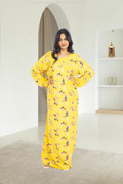 قميص روز نسائي طويل لون أصفر بطبعات ورود كامل أكمام طويلة مزمومة وفتحة صدر دائرية بزم خفيف بشكل مثلث من الأمام