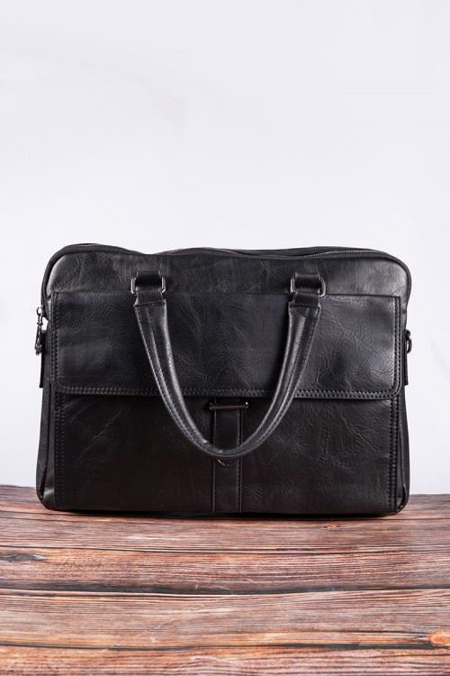 حقيبة يد لون أسود مصنوعة من الجلد بجيوب وسحاب من الأمام والخلف