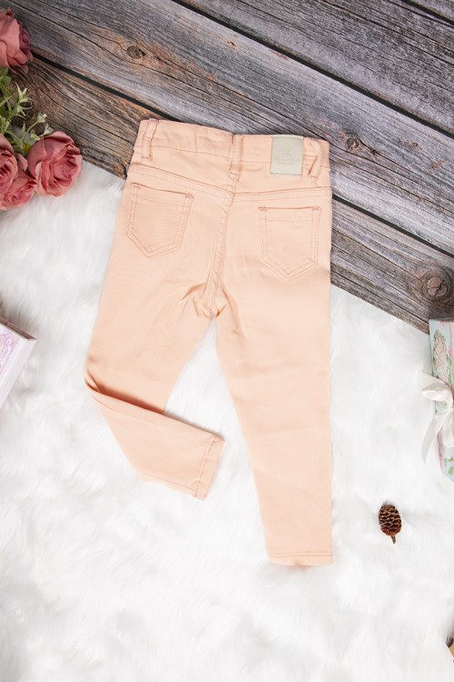 بنطلون بناتي سكيني أنيق لون برتقالي فاتح بجيوب من الأمام والخلف وسحاب و زر قفل