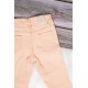 بنطلون بناتي سكيني أنيق لون برتقالي فاتح بجيوب من الأمام والخلف وسحاب و زر قفل