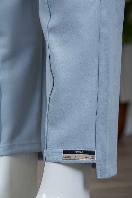 بنطلون شتوي أنيق قماش مخمل لون سماوي بجيوب من الجوانب و الخلف و خصر مطاط برباط من الأمام