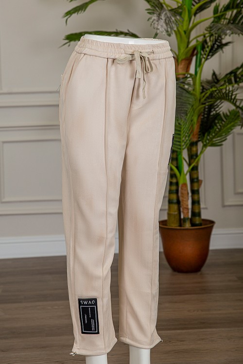 بنطلون شتوي أنيق قماش مخمل لون سكري بجيوب من الجوانب و الخلف و خصر مطاط برباط من الأمام