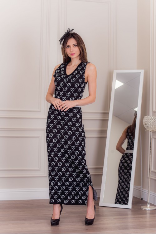 فستان شتوي نسائي أنيق بدون أكمام لون أسود وأبيض وأزرار ذهبية من الخصر