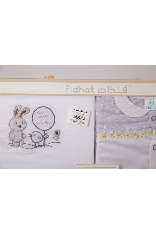 طقم هدايا مواليد 8 قطع لون وردي وبيج مزينة برسومات كرتونية