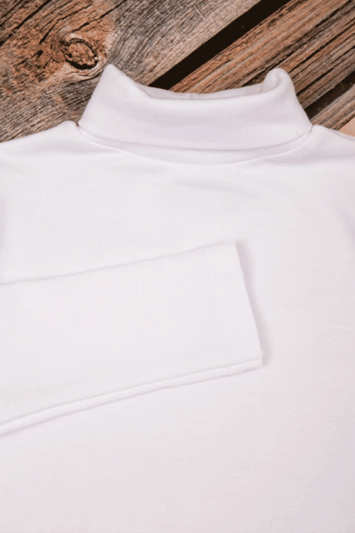 بلوزة أطفال شتوية لون أبيض برقبة و أكمام طويلة