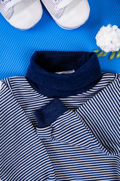 بربتوز أطفال بياقه رقبة مخطط لون أبيض وأزرق  كم طويل بمطاط وأزرار من الأسفل