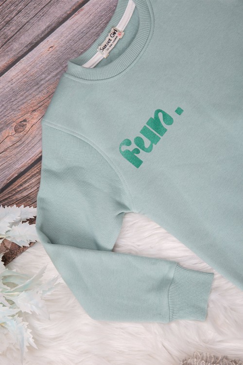 طقم شتوي بناتي أنيق قطعتين لون تركواز   بكتابات من الأمام