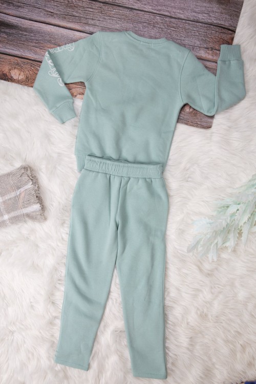 طقم شتوي بناتي أنيق قطعتين لون تركواز   بكتابات من الأمام