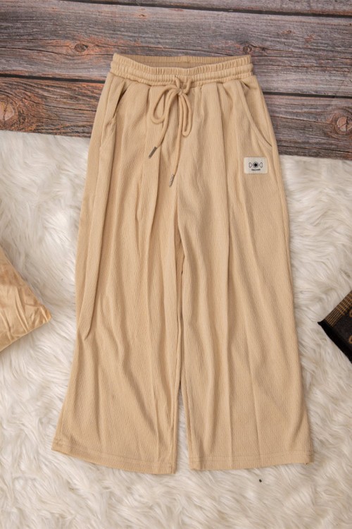 طقم شتوي ولادي  أنيق قطعتين لون بيج  بكتابات من الأمام