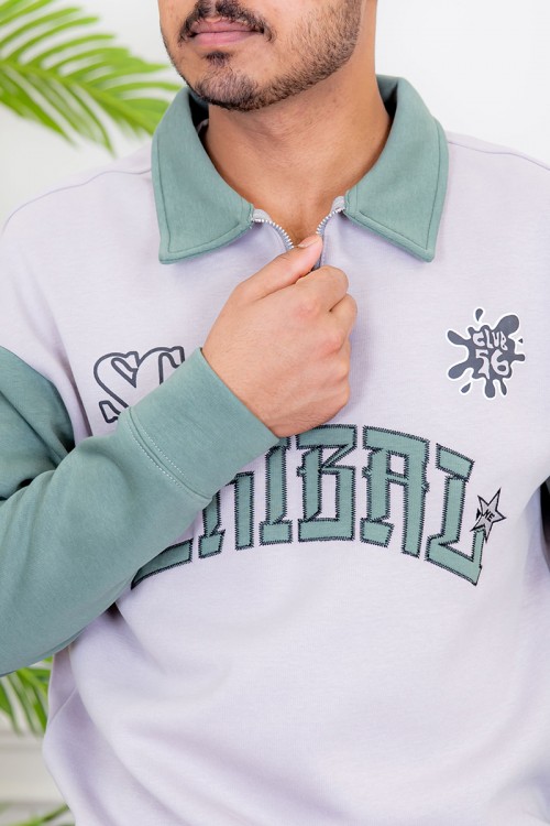 طقم رجالي شتوي قطعتين لون رمادي و تفاحي ياقة بسحاب صغير و كتابات من الأمام و أكمام طويلة