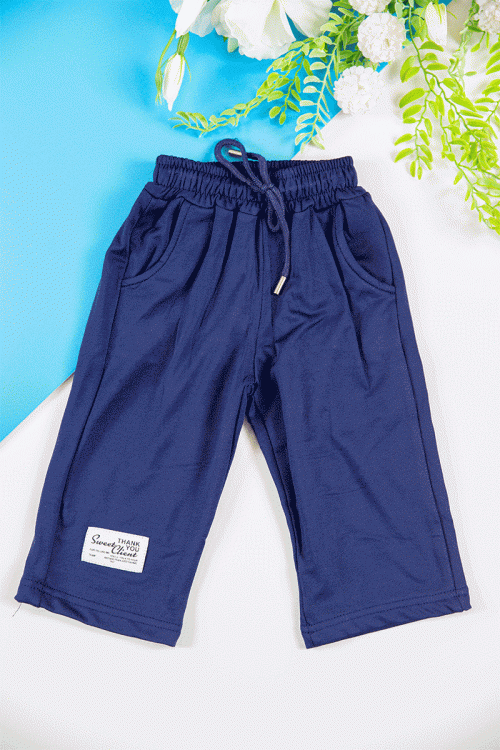 طقم قطعتين ولادي أطفال شتوي لون كحلي بكتابات من الأمام و بقبعة رأس  و أكمام طويلة و رباط و زم من الخصر