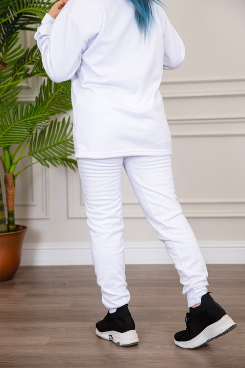 بيجاما نسائية شتوية قطعتين لون أبيض سادة بياقة دائرية و بأكمام و بنطلون طويل