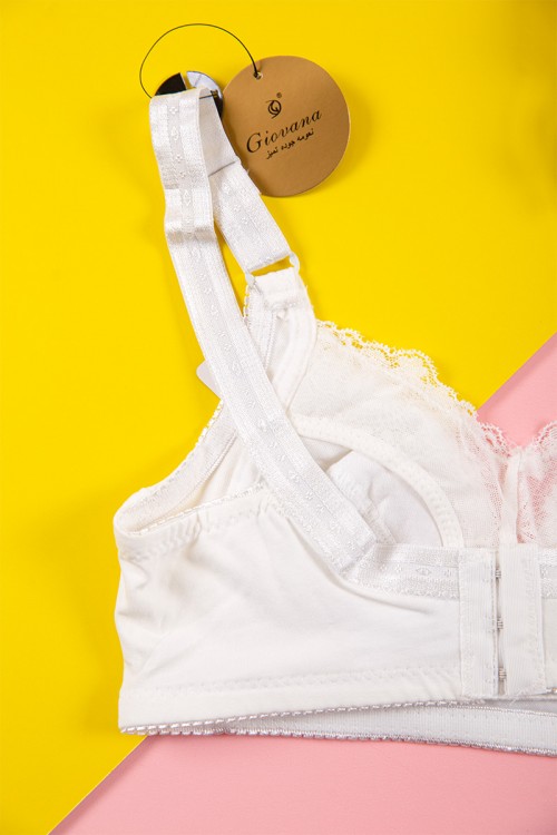 صدرية نسائي لون أبيض مزينة بأزرار و قماش دانتيل من الأمام بأحزمة قابلة للتعديل من الخلف