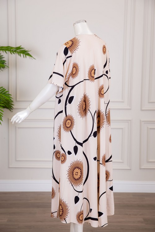 قميص نسائي كلوش لون بيج فاتح بطبعة زهور و بياقة قصة سبعة ذو أكمام قصيرة