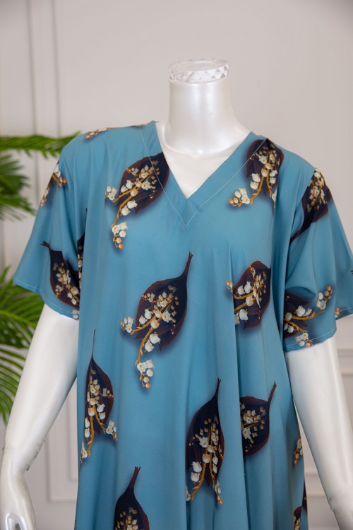 قميص نسائي كلوش لون سماوي بطبعة ورق الشجر و الزهور بياقة قصة سبعة ذو أكمام قصيرة