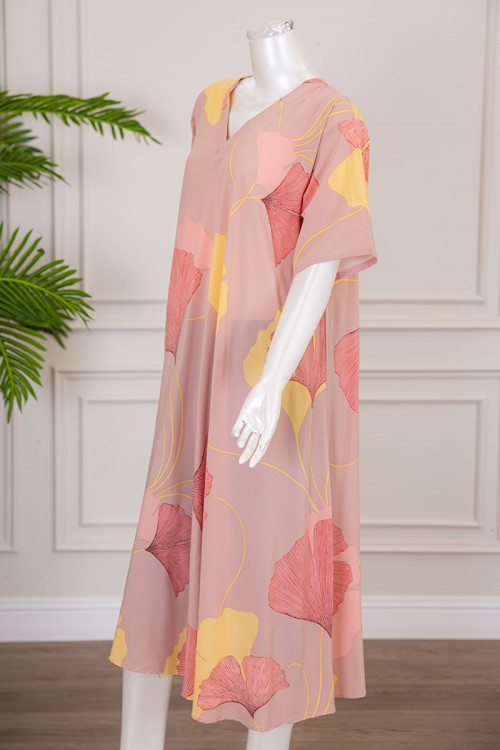 قميص نسائي كلوش لون خربزي بطبعة زهور و بياقة قصة سبعة ذو أكمام قصيرة