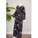 قميص نسائي طويل لون أسود بطبعة زهور و بياقة قصة سبعة ذو أكمام طويلة