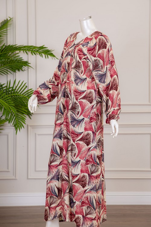 قميص نسائي طويل لون بيج فاتح بطبعات ملونة و بياقة قصة سبعة ذو أكمام طويلة