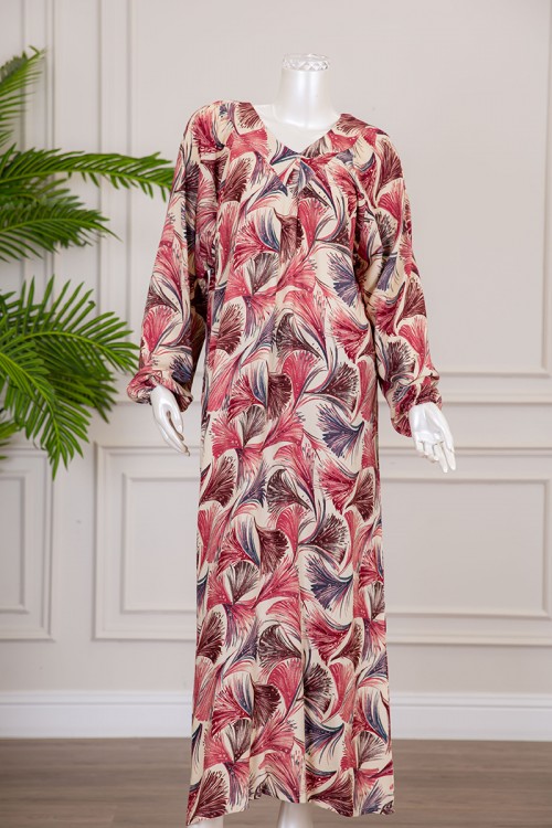 قميص نسائي طويل لون بيج فاتح بطبعات ملونة و بياقة قصة سبعة ذو أكمام طويلة