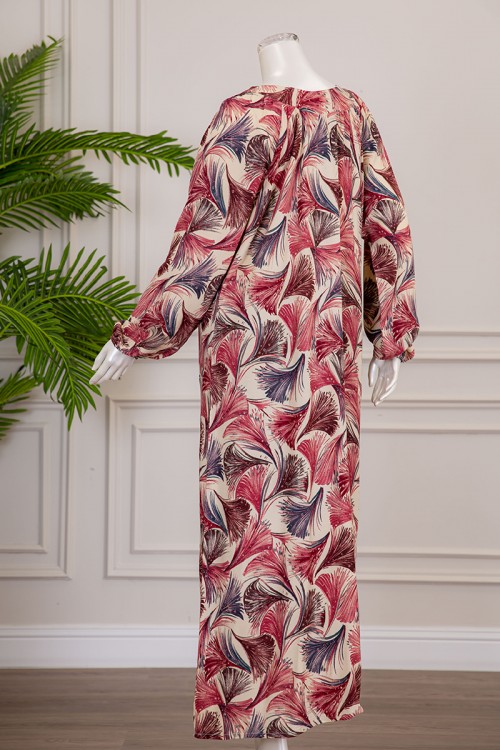 قميص نسائي طويل لون بيج فاتح بطبعات ملونة و بياقة قصة سبعة ذو أكمام طويلة