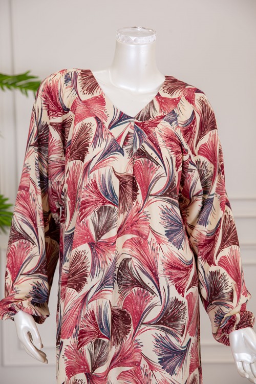 قميص نسائي طويل لون بيج فاتح بطبعات ملونة و بياقة قصة سبعة ذو أكمام طويلة