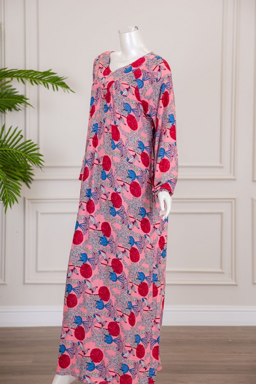 قميص نسائي طويل لون وردي بطبعة ورود و بياقة دائرية ذو أكمام طويلة