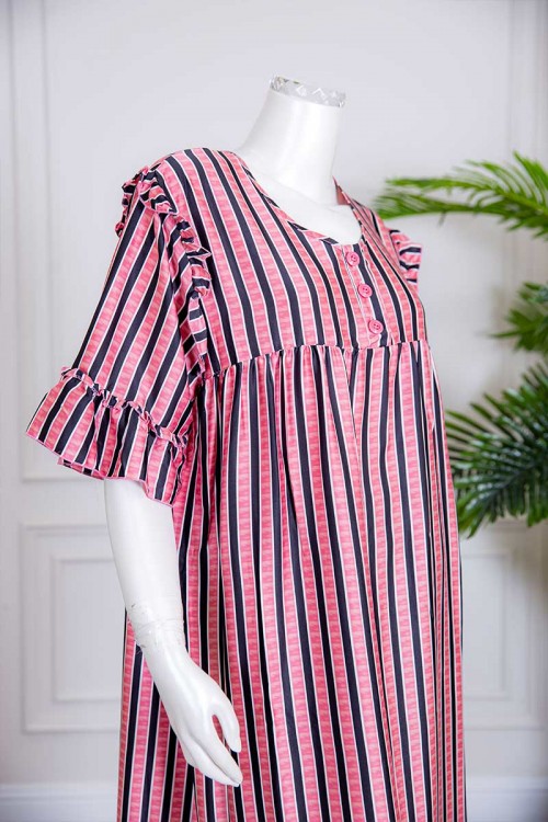 قميص نسائي طويل لون سماوي بياقة دائرية مشجر و بأزرار من الأمام ذو أكمام قصيرة