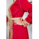 جلابية نسائية لون أحمر مزينة بتطريز ذهبي و بأزرار من الأمام و بحزام في الخصر مزين بفصوص من الاكسسوار