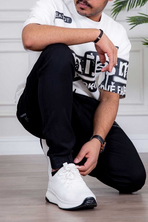 بنطلون رجالي لون أسود بجيوب من الجانبين و الخلف و برباط في الخصر