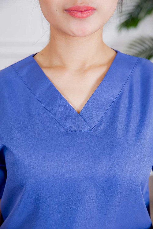 زي عاملة قطعتين متعددة الألوان بلوزة قصة سبعة بأكمام قصيرة و جيوب من الأمام و بنطلون طويل