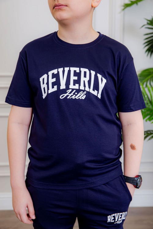 ترنج ولادي قطعتين لون كحلي تيشيرت بكتابات من الأمام و بنطلون بجيوب من الجانبين