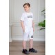ترنج ولادي قطعتين لون أبيض تيشيرت بكتابات من الأمام و شورت بكتابات من الأمام و جيوب من الجانبين