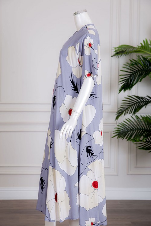 قميص نسائي متعدد الألوان مزين بطبعات من الورود بياقة سبعة و أكمام قصيرة