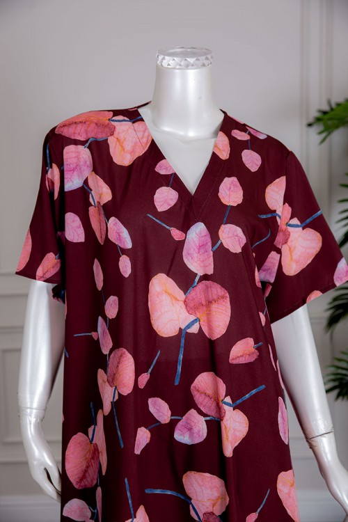 قميص نسائي متعدد الألوان مزين بطبعات من الورود بياقة سبعة و أكمام قصيرة