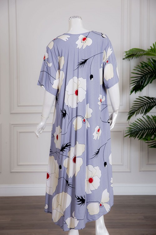 قميص نسائي متعدد الألوان مزين بطبعات من الورود بياقة سبعة و أكمام قصيرة