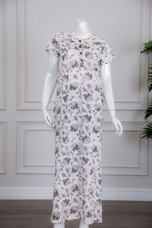 قميص نسائي لون أبيض مشجر بياقة دائرية و أزرار من الأمام ذو أكمام قصيرة