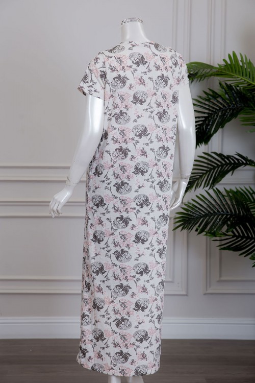 قميص نسائي لون أبيض مشجر بياقة دائرية و أزرار من الأمام ذو أكمام قصيرة