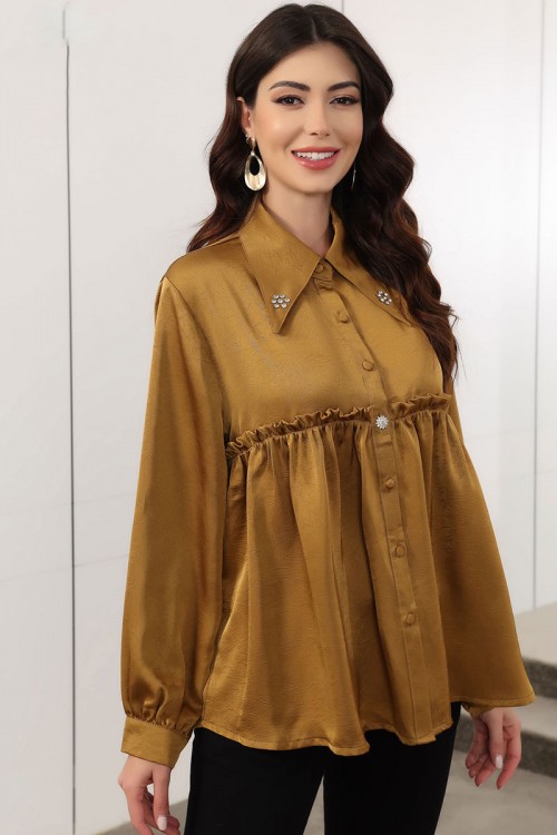 بلوزة نسائية لون كموني بقماش لامع ياقة مطوية و أزرار من الأمام ذو أكمام طويلة