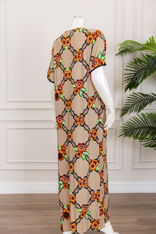 قميص نسائي طويل لون أصفر بياقة دائرية مزين بالورود ذو أكمام قصيرة