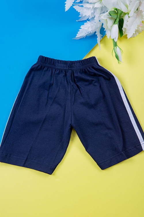 طقم ولادي قطعتين تيشيرت لون بيج غامق مزين بكتابات و رسومات من الأمام مع شورت لون كحلي