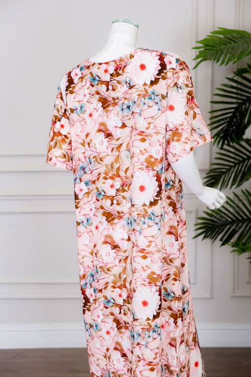 قميص نسائي طويل لون خربزي مشجر بياقة دائرية بأزرار من الأمام ذو أكمام قصيرة