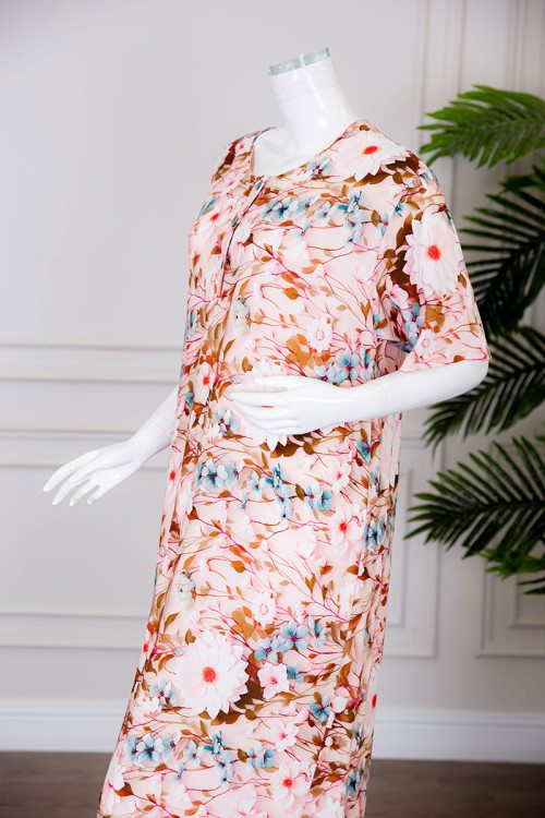 قميص نسائي طويل لون خربزي مشجر بياقة دائرية بأزرار من الأمام ذو أكمام قصيرة