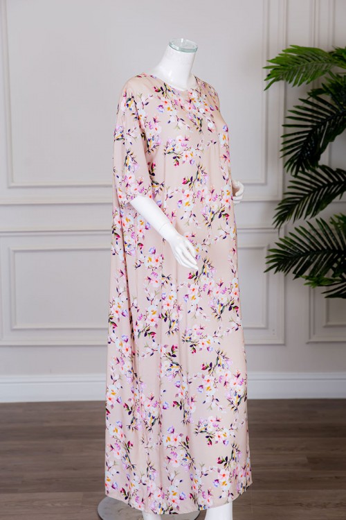 قميص نسائي طويل لون بيج مشجر بياقة دائرية بأزرار من الأمام ذو أكمام قصيرة