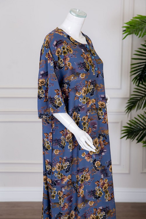 قميص نسائي طويل لون أزرق مشجر بياقة دائرية بأزرار من الأمام ذو أكمام قصيرة