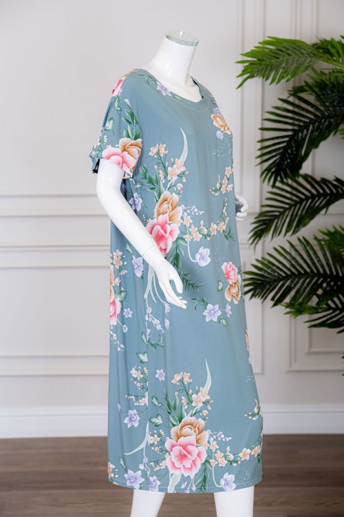 قميص نسائي ميدي لون سماوي مشجر بياقة دائرية ذو أكمام قصيرة