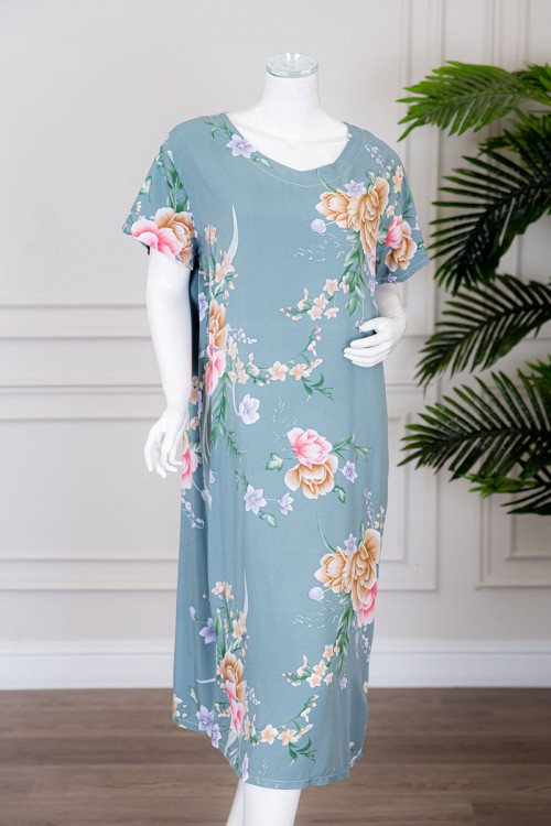 قميص نسائي ميدي لون سماوي مشجر بياقة دائرية ذو أكمام قصيرة